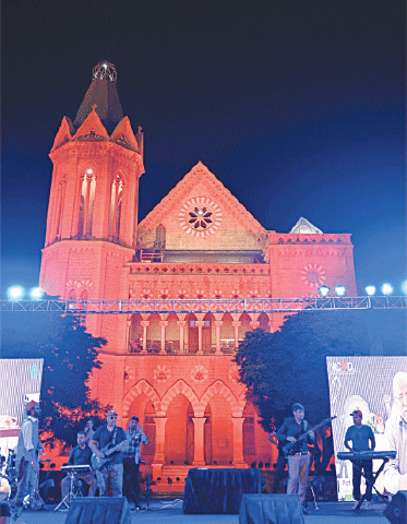 Musicians perform at the festival as Frere Hall is lit in red to mark World Heart Day.&mdash;Dawn