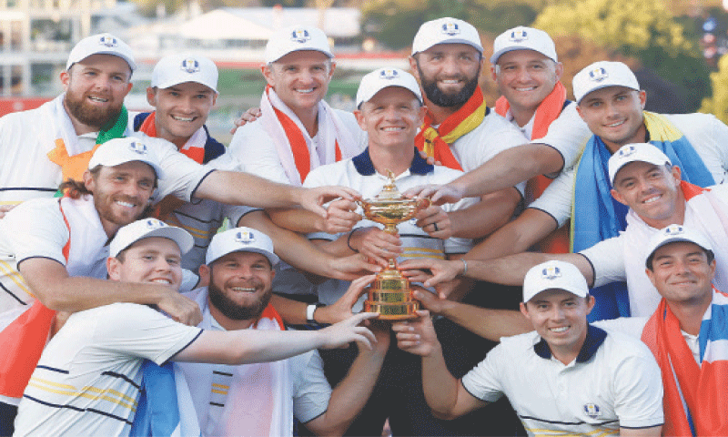 TEAM Europe captain Luke Donald and his players pose with the trophy after winning the Ryder Cup at the Bethpage Black Golf Course.&mdash;Reuters