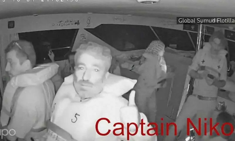 A screengrab from a live video feed shows a man gesturing aboard the Gaza-bound Captain Nikos vessel, part of the Global Sumud Flotilla, off the coast of Gaza on October 1. — Reuters