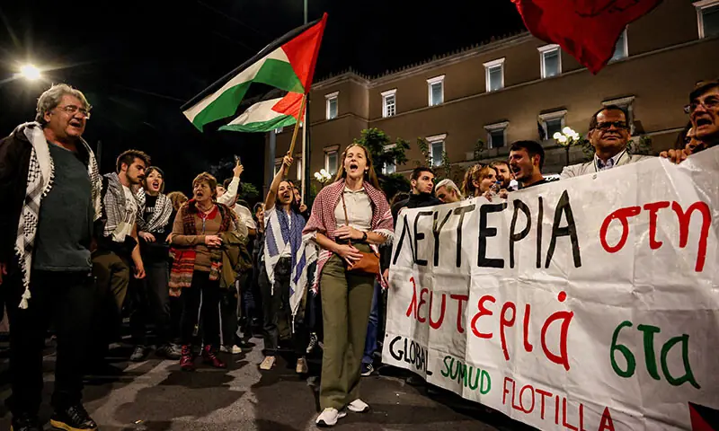 Pro-Palestinian activists protest the interception of the vessels belonging to the Global Sumud Flotilla, outside the Ministry of Foreign Affairs in Athens, Greece on October 1. &mdash; Reuters