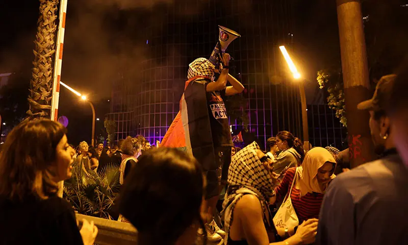 People protest in front of the Israeli embassy in Barcelona after vessels of the Global Sumud Flotilla were intercepted by Israel en route to Gaza, in Barcelona, Spain on October 1. &mdash; Reuters