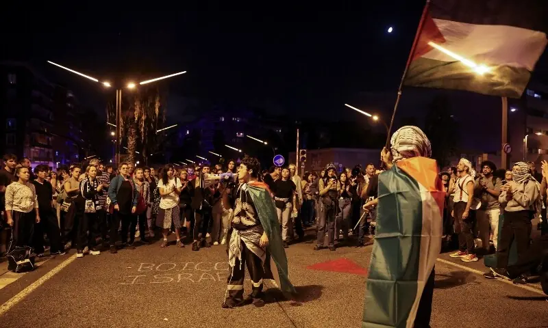 People chant as they protest in front of the Israeli embassy in Barcelona after vessels of the Global Sumud Flotilla were intercepted en route to Gaza, in Barcelona, Spain, October 1. &mdash; Reuters