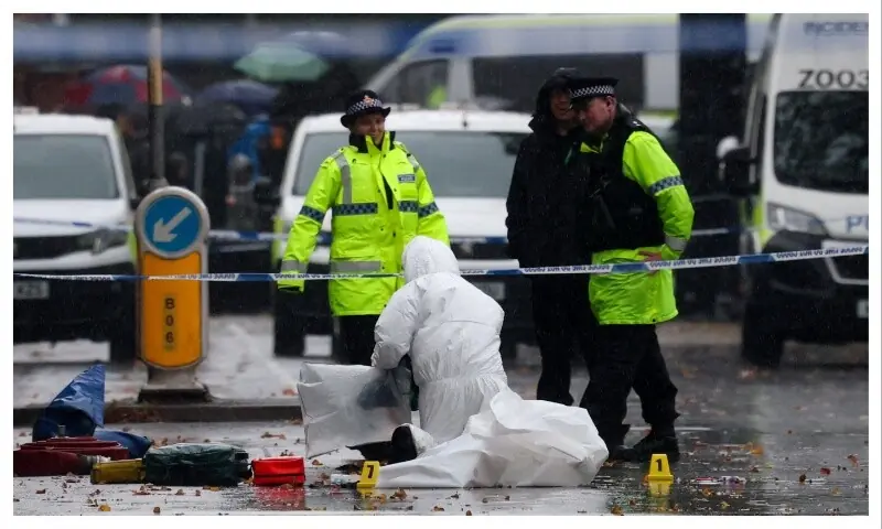 Police and a member of a forensic team work outside the Manchester synagogue, where multiple people were killed on Yom Kippur in what police have declared a terrorist incident, in north Manchester, Britain on October 3, 2025. — Reuters/Phil Noble Police and a member of a forensic team work outside the Manchester synagogue, where multiple people were killed on Yom Kippur in what police have declared a terrorist incident, in north Manchester, Britain on October 3, 2025. — Reuters/Phil Noble