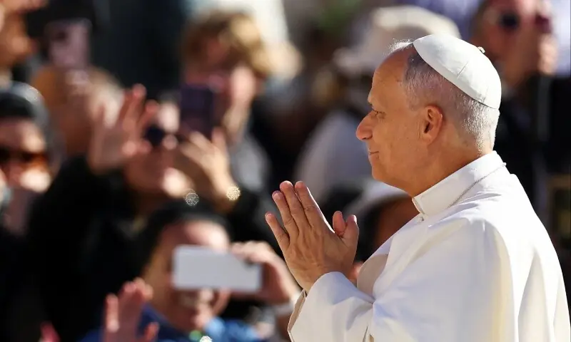 Pope Leo XIV gestures on the day he holds an audience for the Jubilee of Migrants at the Vatican, October 4, 2025. &mdash; Reuters/Ciro De Luca