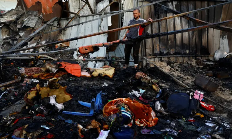 A Palestinian man inspects the damage in the aftermath of an Israeli strike on a tent camp, in Khan Younis in the southern Gaza Strip, on December 5, 2024. — Reuters