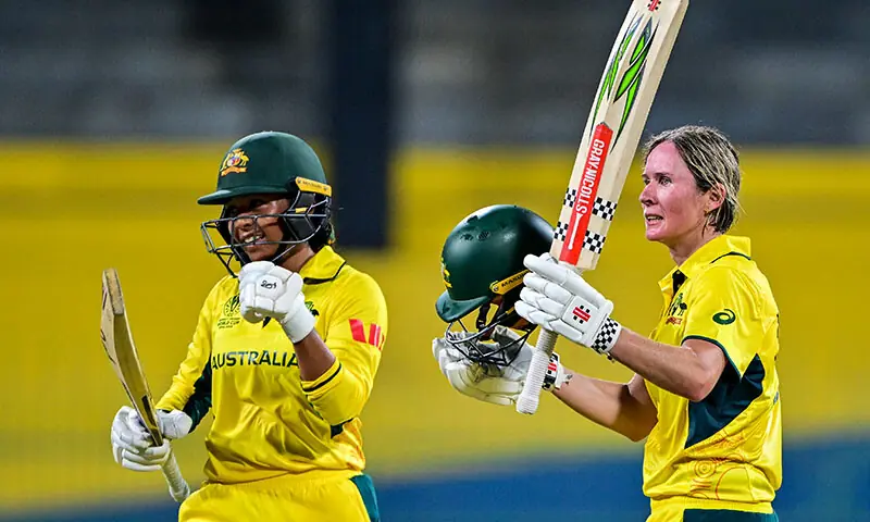 Australia&rsquo;s Beth Mooney (R) celebrates after scoring a century (100 runs) as teammate Alana King looks on during the ICC Women&rsquo;s Cricket World Cup 2025 one-day international (ODI) match between Australia and Pakistan at the R. Premadasa International Cricket Stadium in Colombo on October 8, 2025. &mdash; AFP