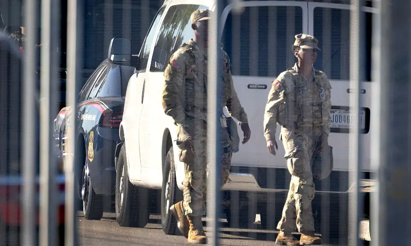 National Guard troops arrive at an immigration processing and detention facility to help supplement DHS personnel with security, in Broadview, Illinois on October 9, 2025. &mdash; AFP