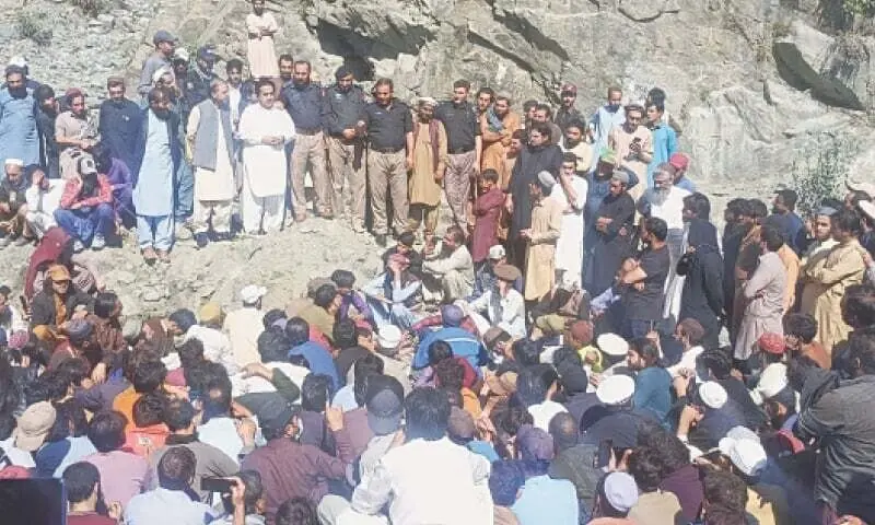 Protesters assemble along KKH in Chuchang area, Upper Kohistan, on Friday. &mdash; Dawn