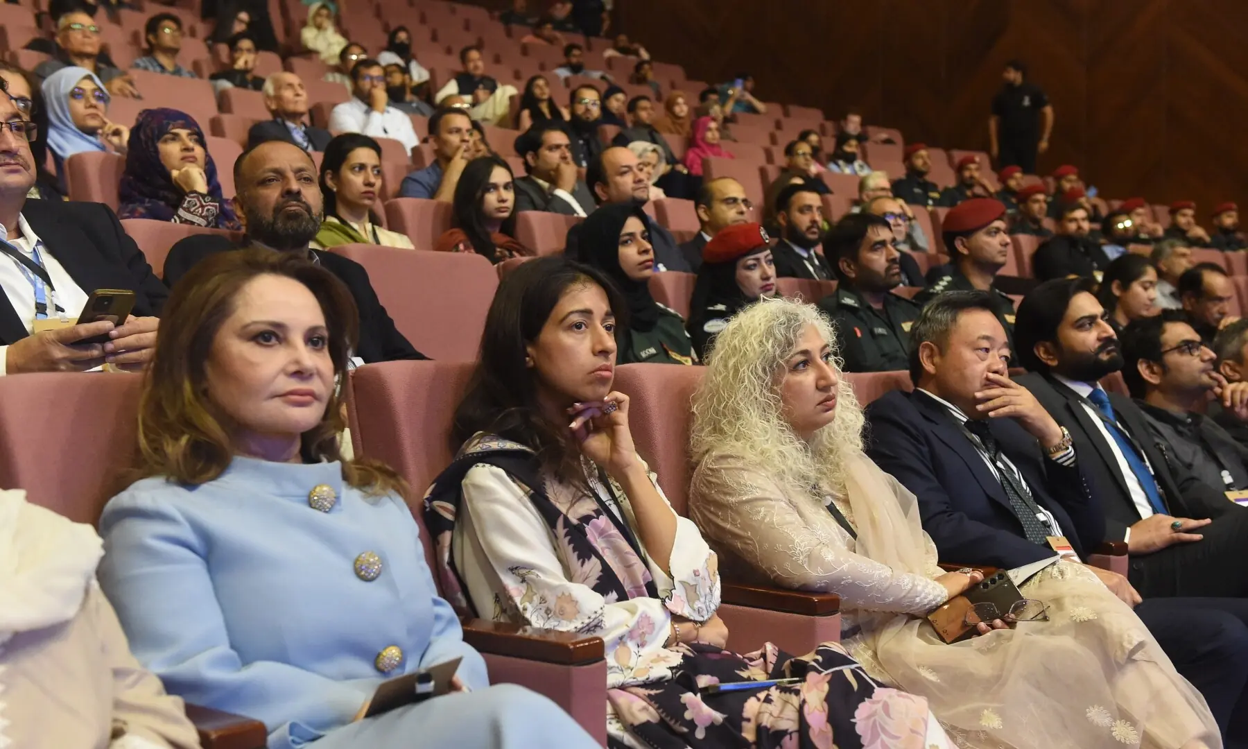 Participants listen to Marriyum Aurangzeb. — Murtaza Ali / White Star
