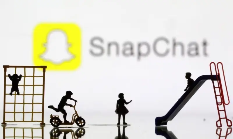 Children playground miniatures are seen in front of displayed Snapchat logo in this illustration taken April 4, 2023. &mdash;Reuters