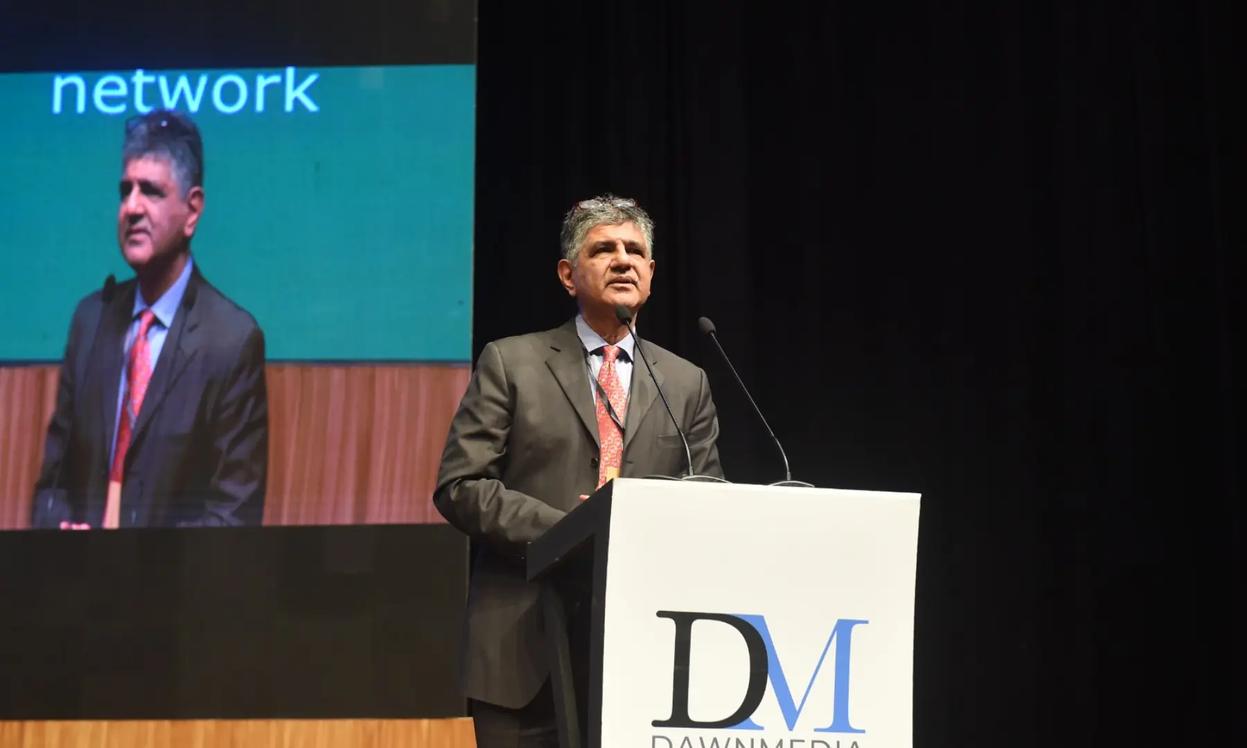 PSO Board of Management Chairman Asif Baigmohamed speaks at the conference. — Murtaza Ali / White Star