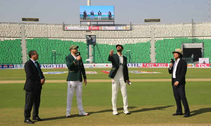 Pakistan&rsquo;s captain Shan Masood and his South African counterpart Aiden Markram during the toss before the start of the first day of the first Test cricket match between Pakistan and South Africa at the Gaddafi Stadium in Lahore on Oct 12, 2025. &mdash; X/The RealPCB