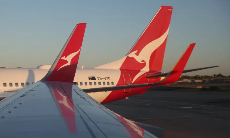 In this file photo, a Qantas logo is visible on the tail of an aeroplane at an airport in Sydney, Australia on September 18, 2025. &mdash; Reuters
