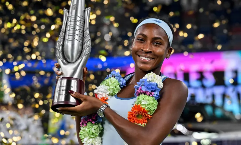 Winner USA&rsquo;s Coco Gauff poses with her trophy after winning against USA&rsquo;s Jessica Pegula during an award ceremony for their women&rsquo;s singles at the Wuhan Open tennis tournament in Wuhan, Central China&rsquo;s Hubei province on October 12, 2025. &mdash; AFP