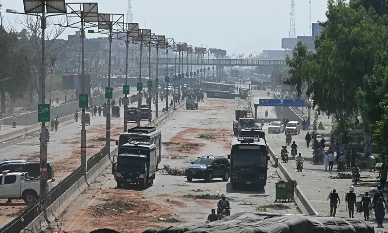 Police personnel patrol a street following crackdown on Tehreek-i-Labbaik Pakistan activists during an anti-Israel protest in Muridke on October 13, 2025. &mdash; AFP