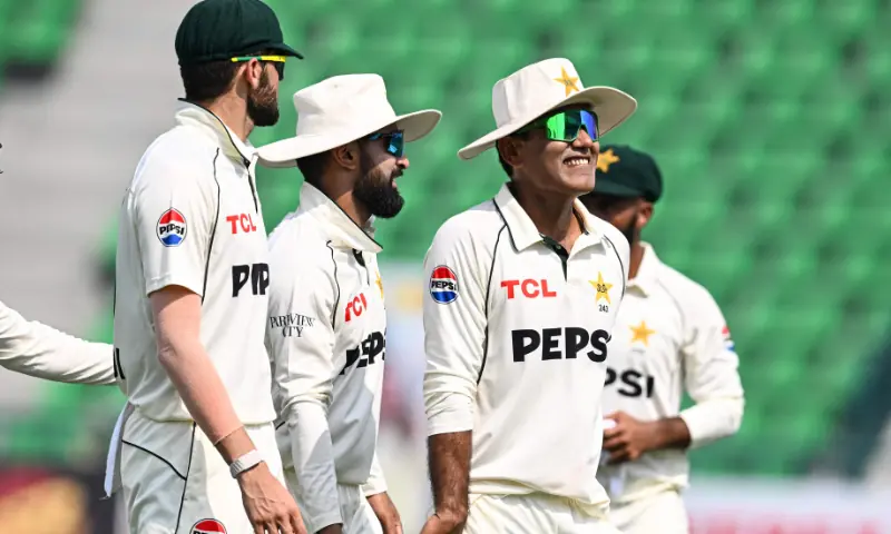 Pakistan&rsquo;s Noman Ali (R) and teammates walk back to pavilion during lunch break on the fourth day of the first Test match between Pakistan and South Africa at the Gaddafi SCtadium in Lahore on October 15, 2025. &mdash; AFP