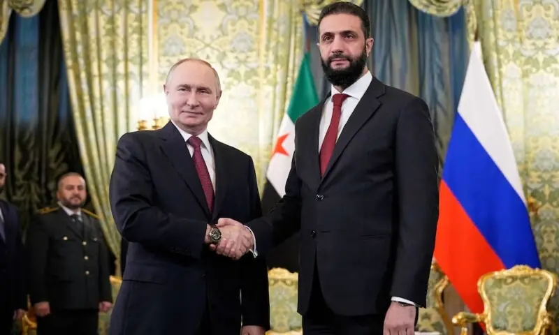 Russia&rsquo;s President Vladimir Putin shakes hands with Syria&rsquo;s President Ahmed al-Sharaa during a meeting at the Kremlin in Moscow, Russia, October 15. &mdash; via Reuters