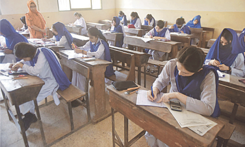 In this file photo, students take their first intermediate paper at an exam centre. &mdash; Fahim Siddiqi / White Star/File