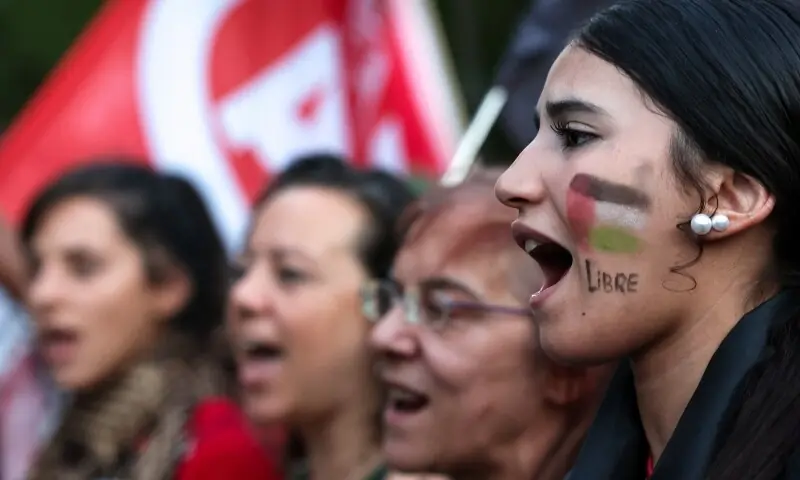 Demonstrators shout slogans during a general strike called by Spanish unions in solidarity with Palestinians in Gaza, in Madrid, Spain, on October 15. &mdash; Reuters