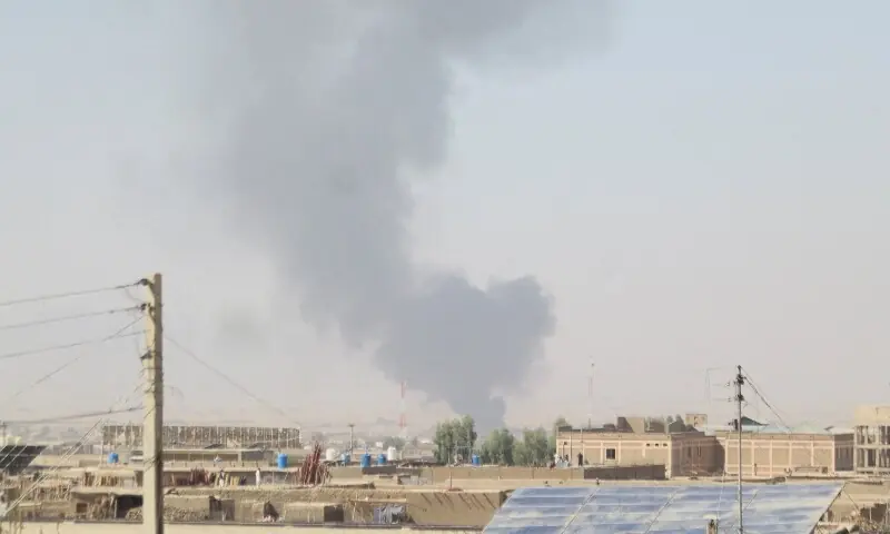 Smoke billows from the Afghanistan side following exchanges of fire between Pakistani and Afghan forces, as seen from the border crossing in Chaman on October 15. — Reuters