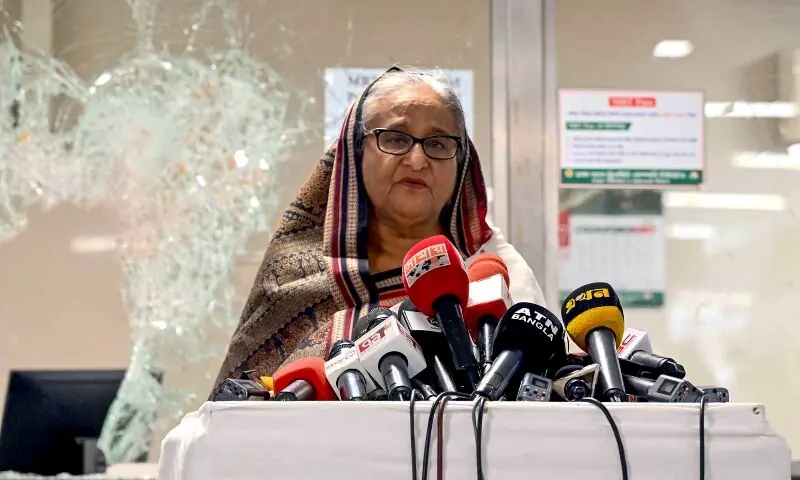 In this handout photograph taken and released on July 25, 2024 by Bangladesh Prime Minister&rsquo;s Office, Prime Minister Sheikh Hasina addresses the media at a vandalized metro station in Mirpur, after the anti-quota protests. &mdash; AFP