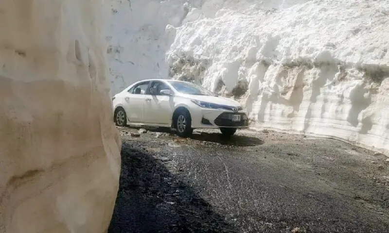 Image shows a vehicle travelling through Babusar Pass. — File photo Image shows a vehicle travelling through Babusar Pass. — File photo