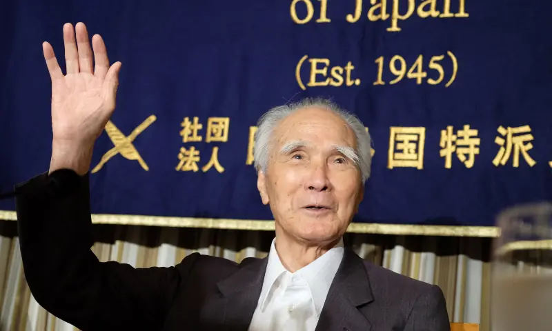 In this file photo, former Japanese prime minister Tomiichi Murayama waves to reporters at the Foreign Correspondents&rsquo; Club of Japan in Tokyo on July 29, 2015. &mdash; AFP/File