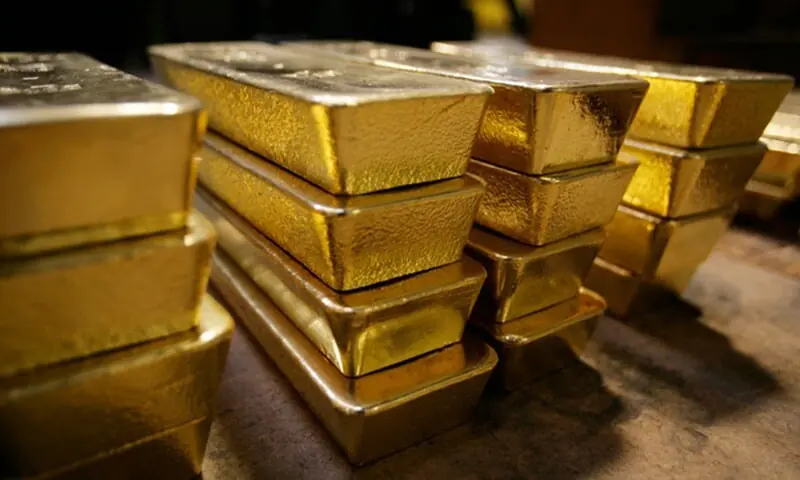 A file photo of stacks of gold bars. &mdash; AFP/File