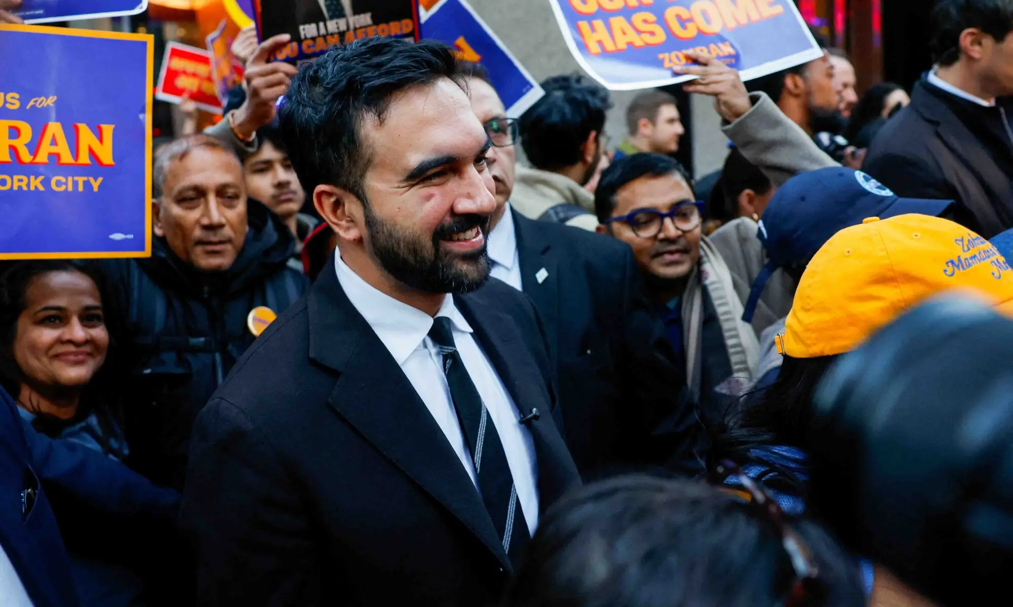 New York City mayoral candidate Zohran Mamdani walks with supporters for the first mayoral debate in New York City on Oct 16.&mdash;Reuters/file photo