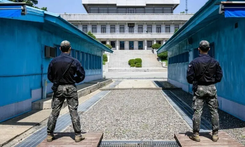 In this photo taken on May 9, 2023, South Korean soldiers stand guard as they face North Korea’s Panmon Hall (back) at the truce village of Panmunjom in the Joint Security Area (JSA) of the Demilitarized Zone (DMZ) separating North and South Korea. — AFP In this photo taken on May 9, 2023, South Korean soldiers stand guard as they face North Korea’s Panmon Hall (back) at the truce village of Panmunjom in the Joint Security Area (JSA) of the Demilitarized Zone (DMZ) separating North and South Korea. — AFP