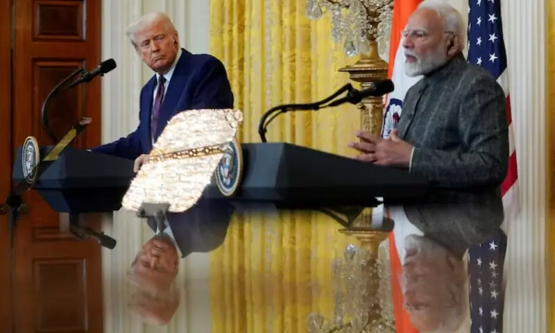 US President Donald Trump and Indian Prime Minister Narendra Modi are pictured in a mirror as they attend a joint press conference at the White House in Washington, February 13. &mdash; Reuters