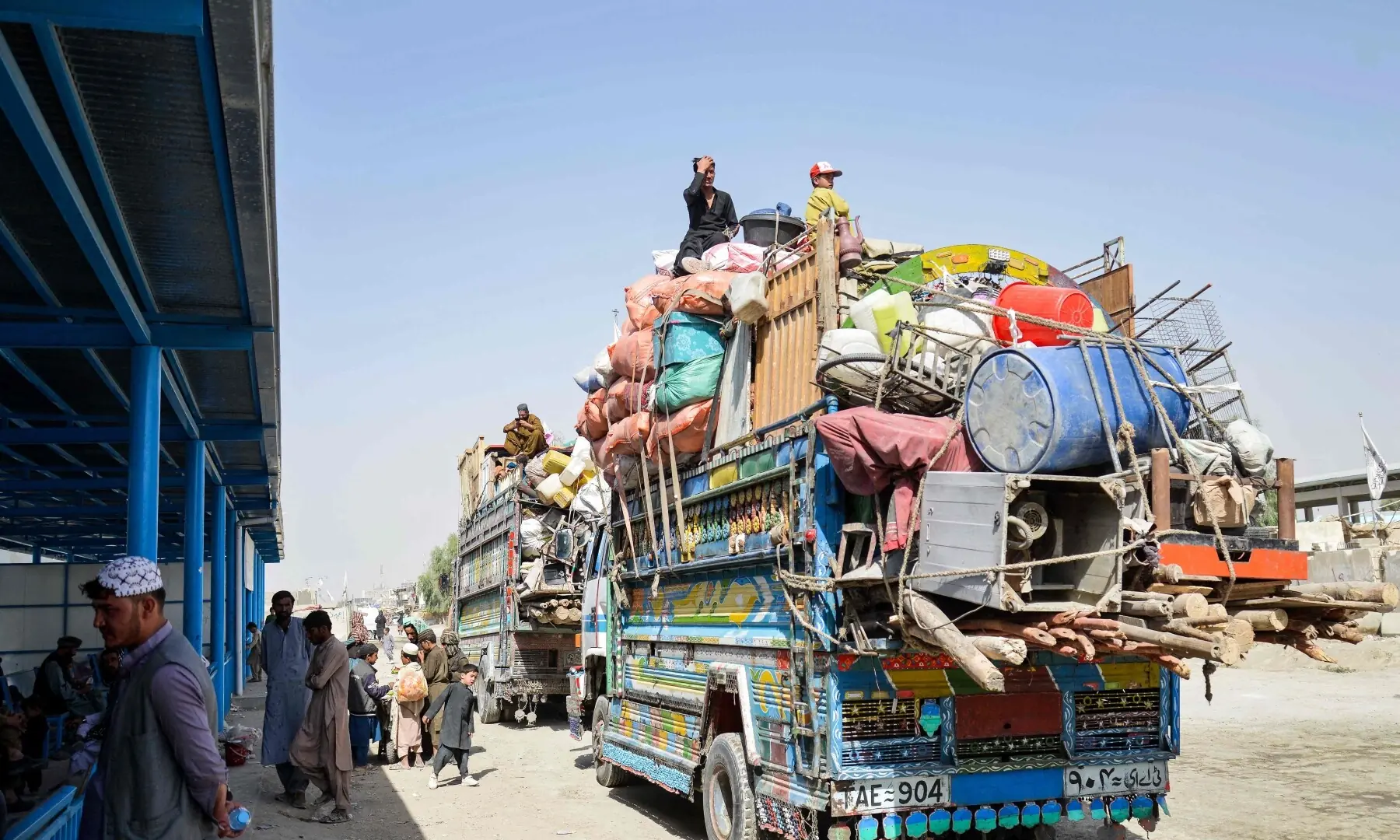  Afghan refugees deported from Pakistan wait inside a registration centre upon their arrival at the zero point border crossing between Afghanistan and Pakistan in the Spin Boldak district of Kandahar, Afghanistan, October 19. &mdash; AFP 