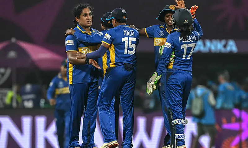 Sri Lanka&rsquo;s captain Chamari Athapaththu (L) and her teammates celebrate after their team&rsquo;s win in the ICC Women&rsquo;s Cricket World Cup 2025 one-day international (ODI) match between Sri Lanka and Bangladesh at the DY Patil Stadium in Navi Mumbai on October 20, 2025. &mdash; AFP