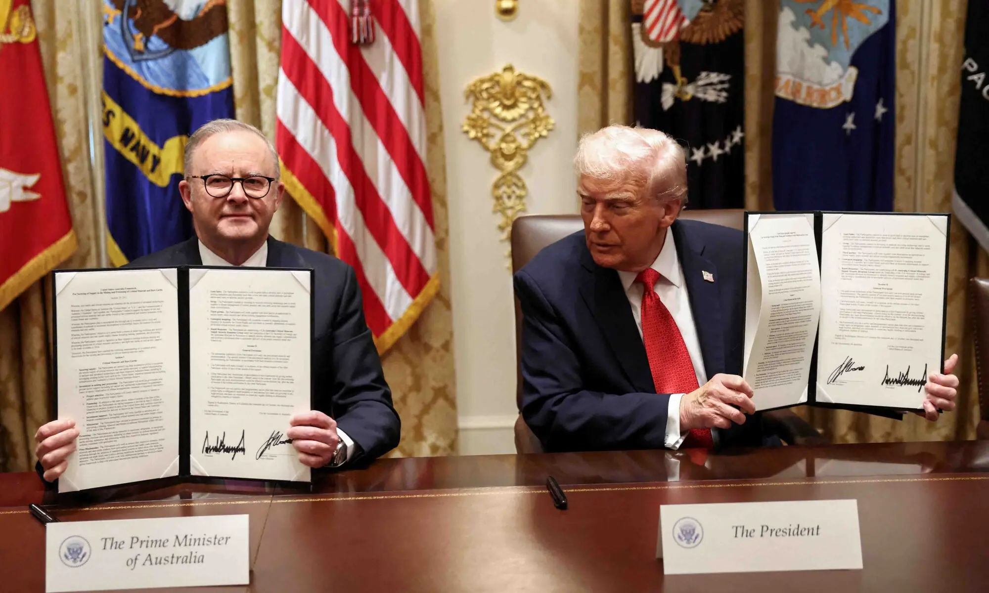 US President Donald Trump and Australia&rsquo;s Prime Minister Anthony Albanese hold a signed agreement on rare earth and critical minerals during a meeting in the White House.&mdash;Reuters