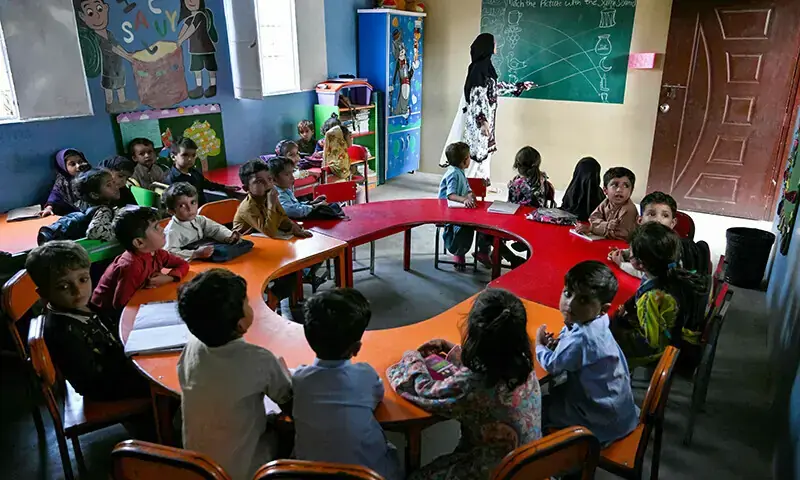 This photo taken on November 13, 2024 shows students attending a class at the non-profit Roshan Pakistan Foundation school, in Abdullah Goth village on the outskirts of Karachi. &mdash; AFP/File