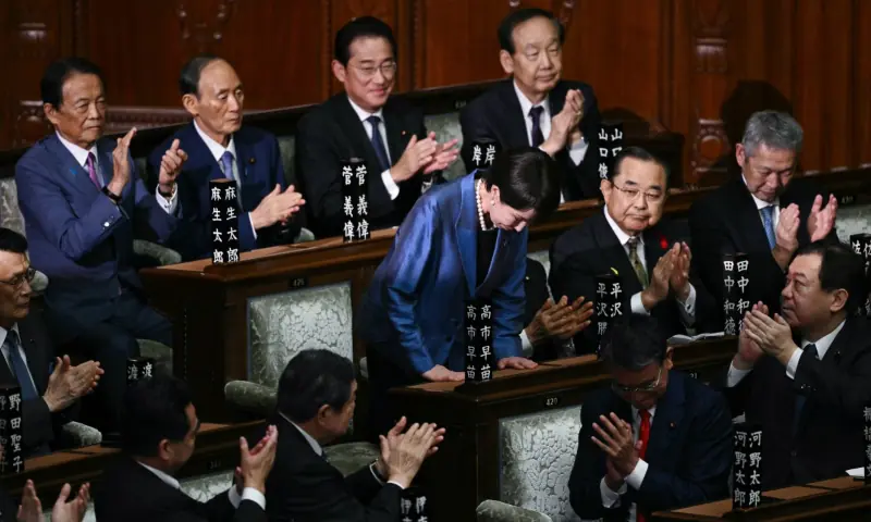 Liberal Democratic Party (LDP) President Sanae Takaichi stands up and bows to acknowledge the applause after she was selected as Japan&rsquo;s new prime minister during an extraordinary session of the lower house of parliament in Tokyo on October 21. &mdash; AFP