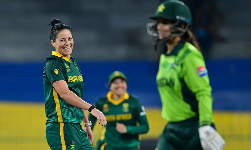 South Africa&rsquo;s Marizanne Kapp (L) celebrates with teammates after taking the wicket of Pakistan&rsquo;s Aliya Riaz (R) during the ICC Women&rsquo;s Cricket World Cup 2025 one-day international (ODI) match between Pakistan and South Africa at the R. Premadasa International Cricket Stadium in Colombo on October 21, 2025. &mdash; AFP