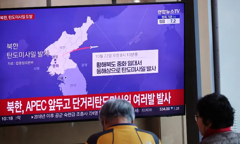 People watch a TV broadcasting a news report on North Korea firing a short-range ballistic missile towards the sea off its east coast, at a railway station in Seoul, South Korea, on Oct 22, 2025. &mdash; Reuters