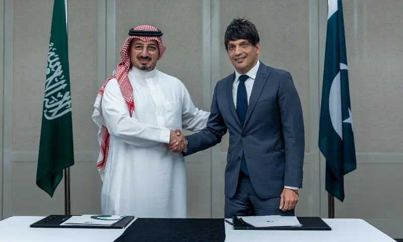 PFF President Mohsen Gilani (R) and SAFF president Yasser Al Misehal (L). &mdash; Photo via Pakistan Football Federation