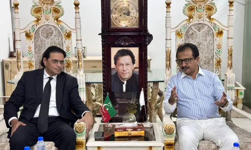 PTI Secretary General Barrister Salman Akram Raja meets PTI Sindh President Haleem Adil Sheikh and other party leaders in a visit to Karachi on Wednesday. — PTI PTI Secretary General Barrister Salman Akram Raja meets PTI Sindh President Haleem Adil Sheikh and other party leaders in a visit to Karachi on Wednesday. — PTI