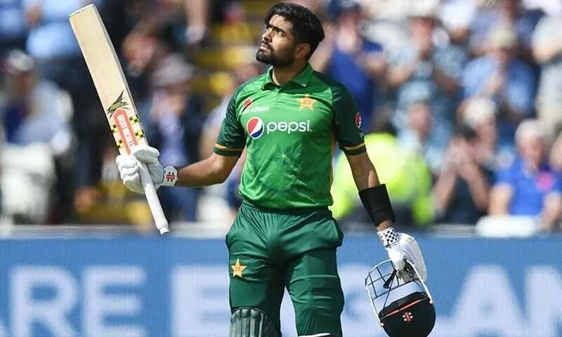 Babar Azam celebrates reaching his century during the third ODI match between England and Pakistan at Edgbaston cricket ground in Birmingham on July 13, 2021. &mdash; AFP