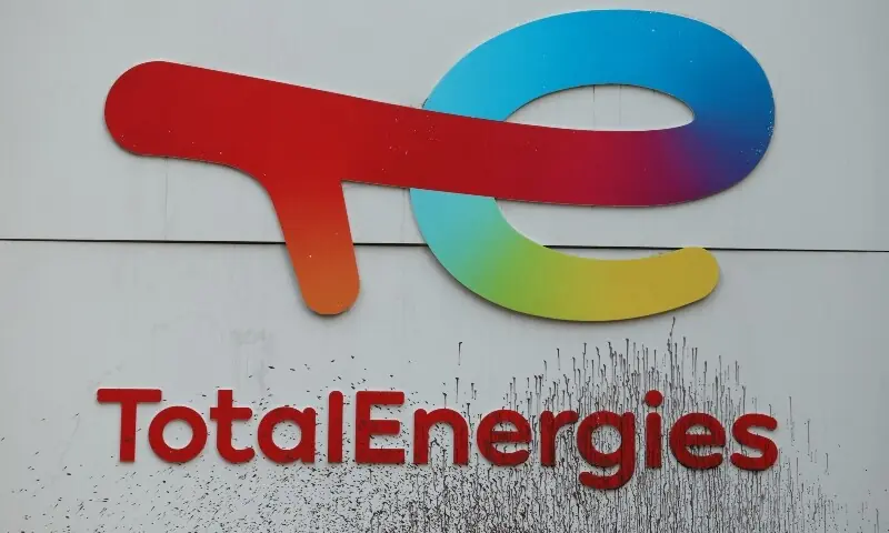 The logo of TotalEnergies is seen smeared during a Greenpeace protest against polluters in front of TotalEnergies&rsquo; headquarters at the La Defense business district, west of Paris, on November 18, 2024. &mdash; AFP