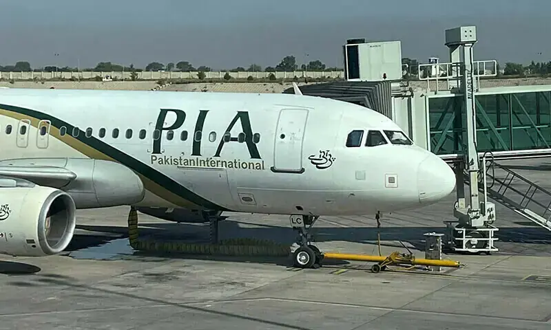 A view of the Pakistan International Airlines (PIA) passenger plane, taken through a glass panel, at Islamabad International Airport, Pakistan on Oct 3, 2023. &mdash; Reuters/File