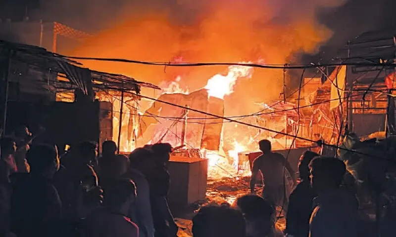 A representational file photo of a fire in a market in Pattoki on August 20, 2023. &mdash; Dawn/File