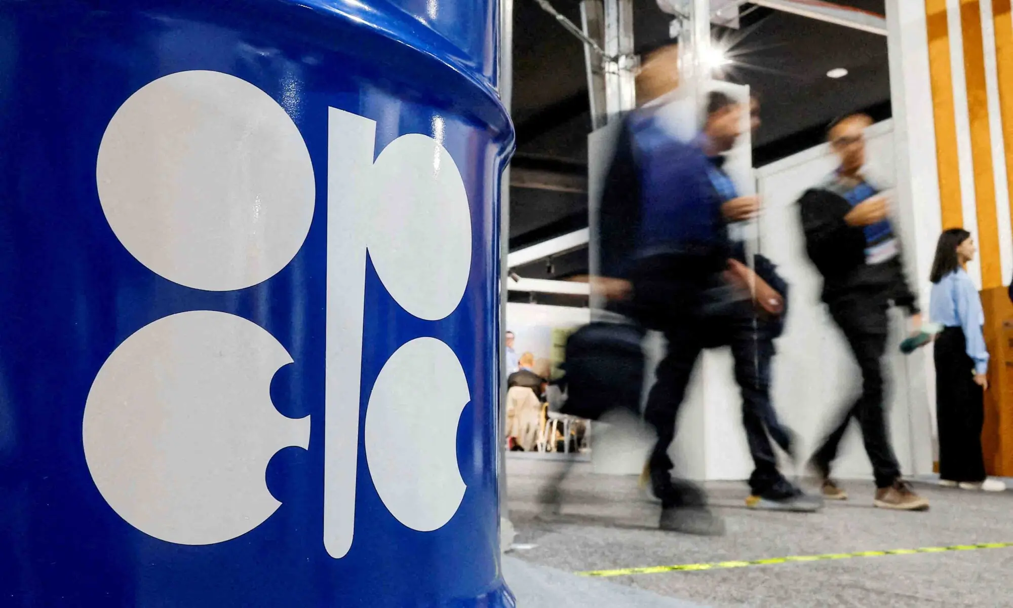 People walk past an installation depicting a barrel of oil with the logo of the Organization of the Petroleum Exporting Countries (OPEC) during the COP29 United Nations climate change conference in Baku, Azerbaijan, November 19, 2024. &mdash; Reuters