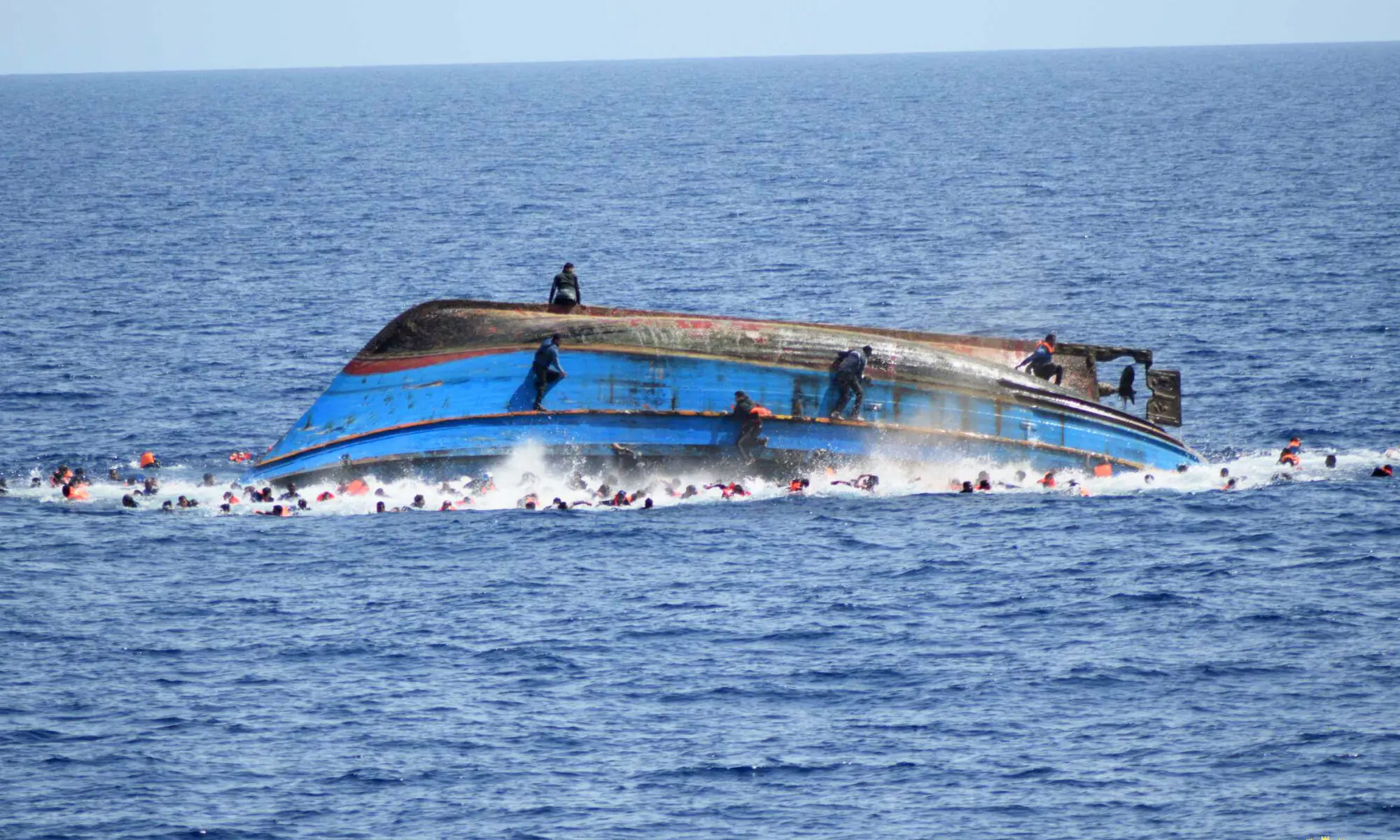A file photo showing the shipwreck of an overcrowded boat of migrants off the Libyan coast. &mdash; AFP