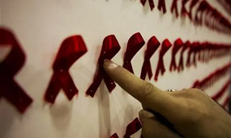 A file photo of HIV ribbons lined up on a wall. &mdash; Reuters/File