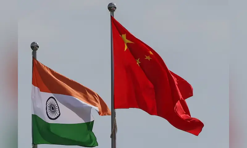 National flags of China and India fly next to the Meijiang Convention and Exhibition Centre, a venue for 2025 Shanghai Cooperation Organisation summit in Tianjin, China on August 30, 2025. &mdash; Reuters/File