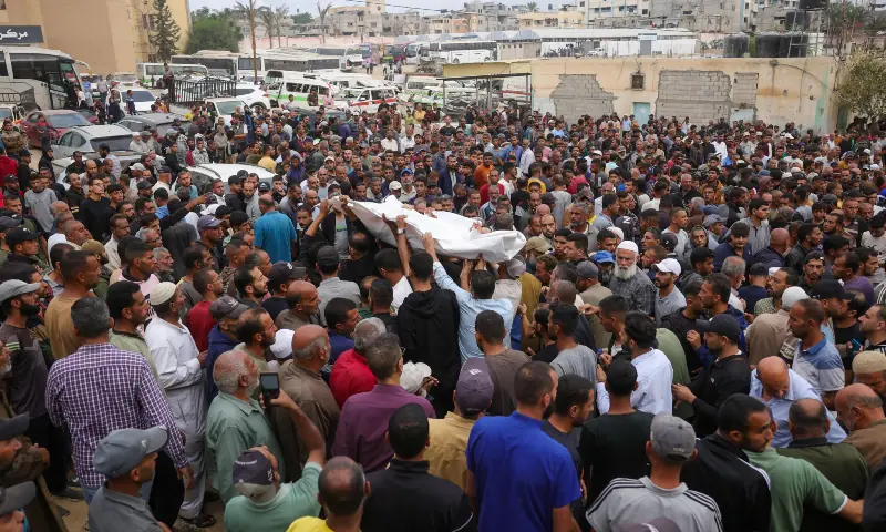 People take part in a funeral for Gazans killed in an Israeli strike, at Nasser Hospital in Khan Younis in the southern Gaza Strip, on Oct 29, 2025. — AFP People take part in a funeral for Gazans killed in an Israeli strike, at Nasser Hospital in Khan Younis in the southern Gaza Strip, on Oct 29, 2025. — AFP