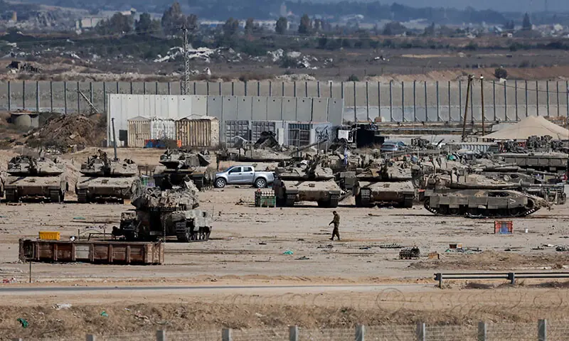 Israeli military personnel operate on the Israeli side of the Israel-Gaza border, on the day the Israeli military said it had resumed implementation of the Gaza ceasefire agreement after a series of attacks across the Gaza Strip in southern Israel on October 29. – Reuters